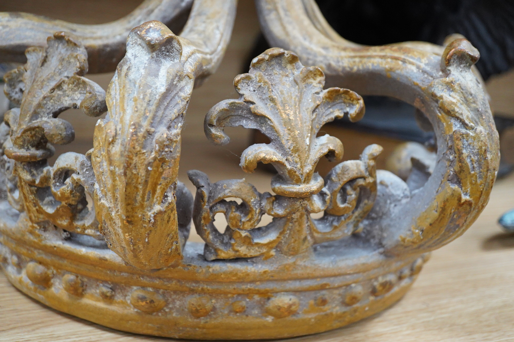 A large gilt painted composition coronet shaped bed canopy, 46cm high